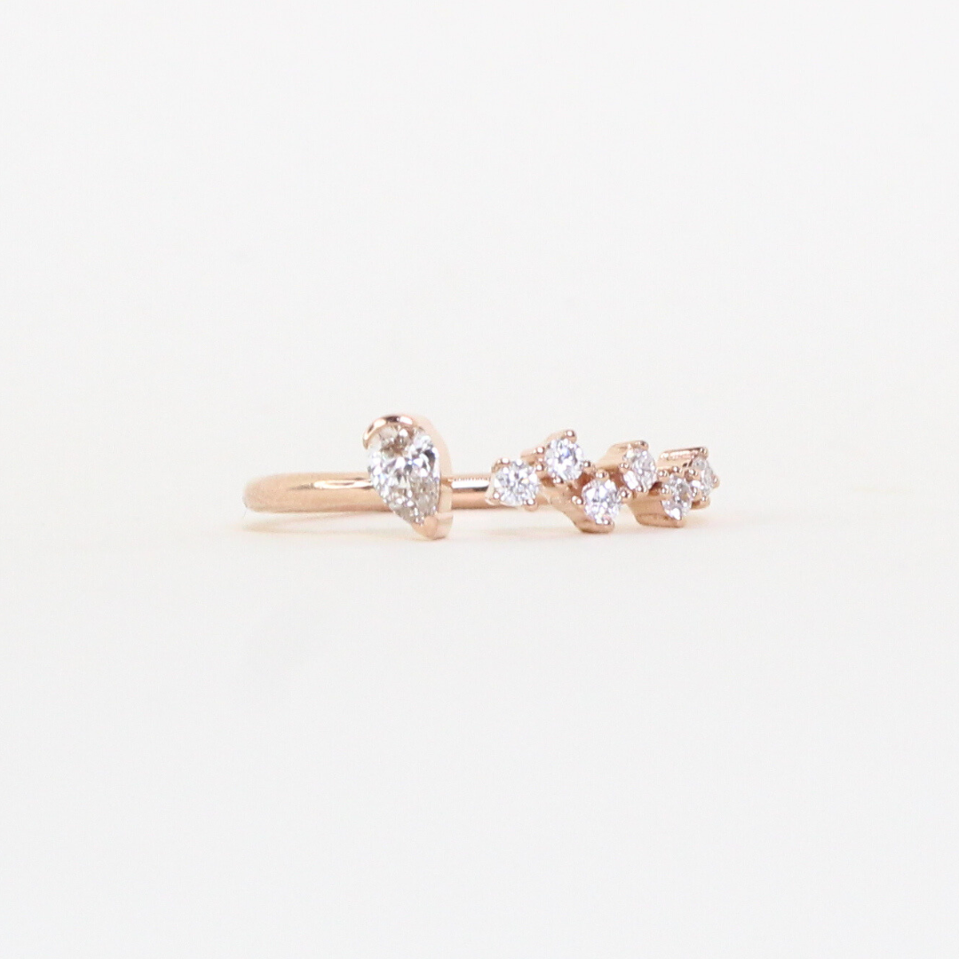 .26cts Pear and Round cut Open ring
