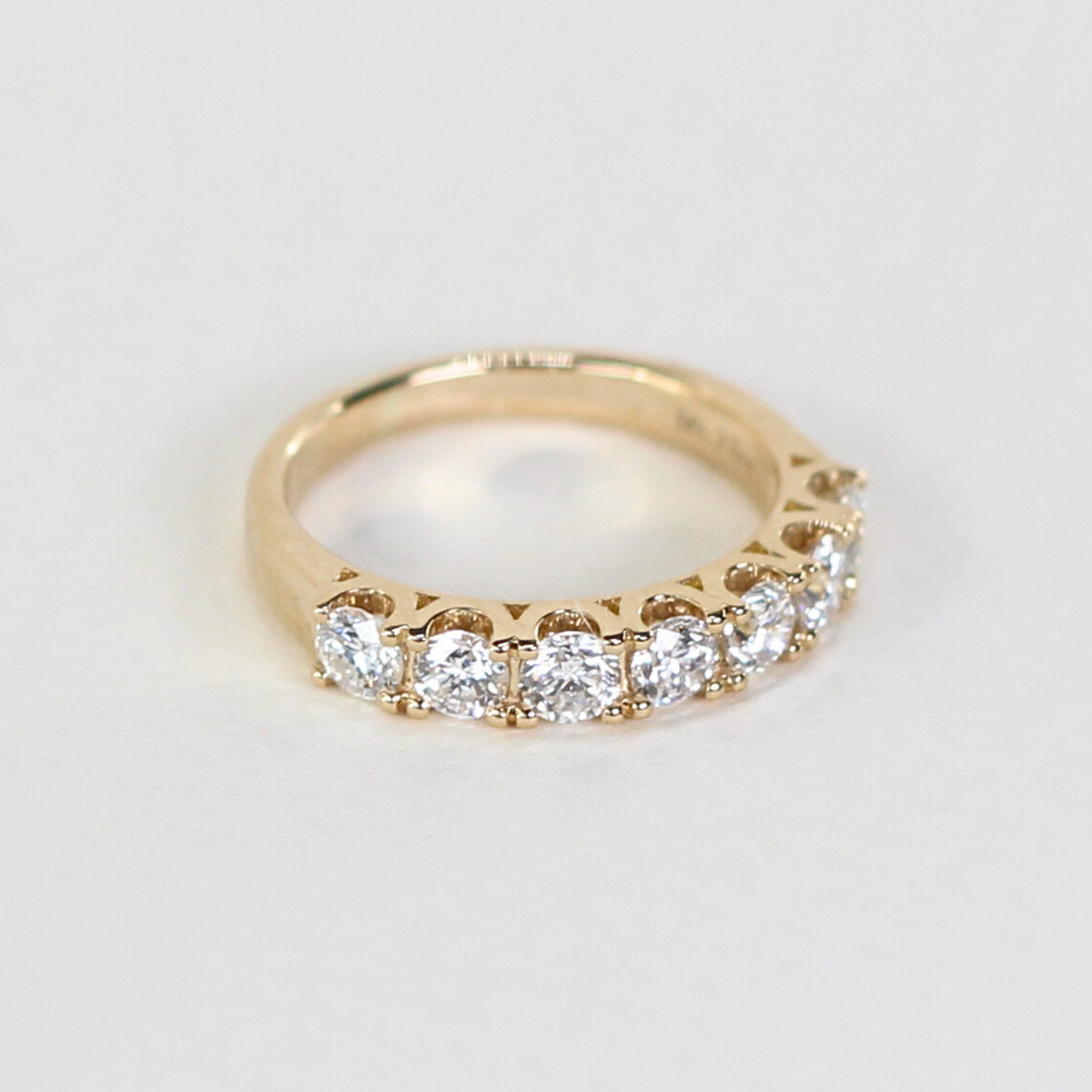 .77cts 7-stone Round cut ring