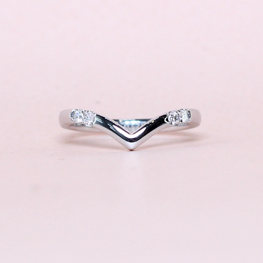 .08cts 4-stone Round cut Chevron Platinum ring