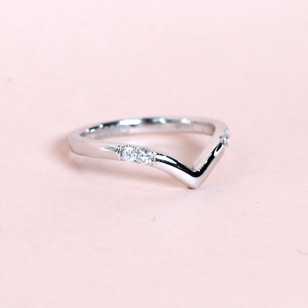 .08cts 4-stone Round cut Chevron Platinum ring