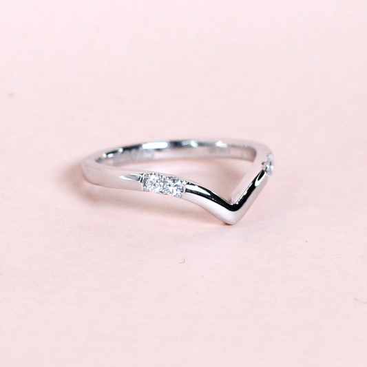 .08cts 4-stone Round cut Chevron Platinum ring