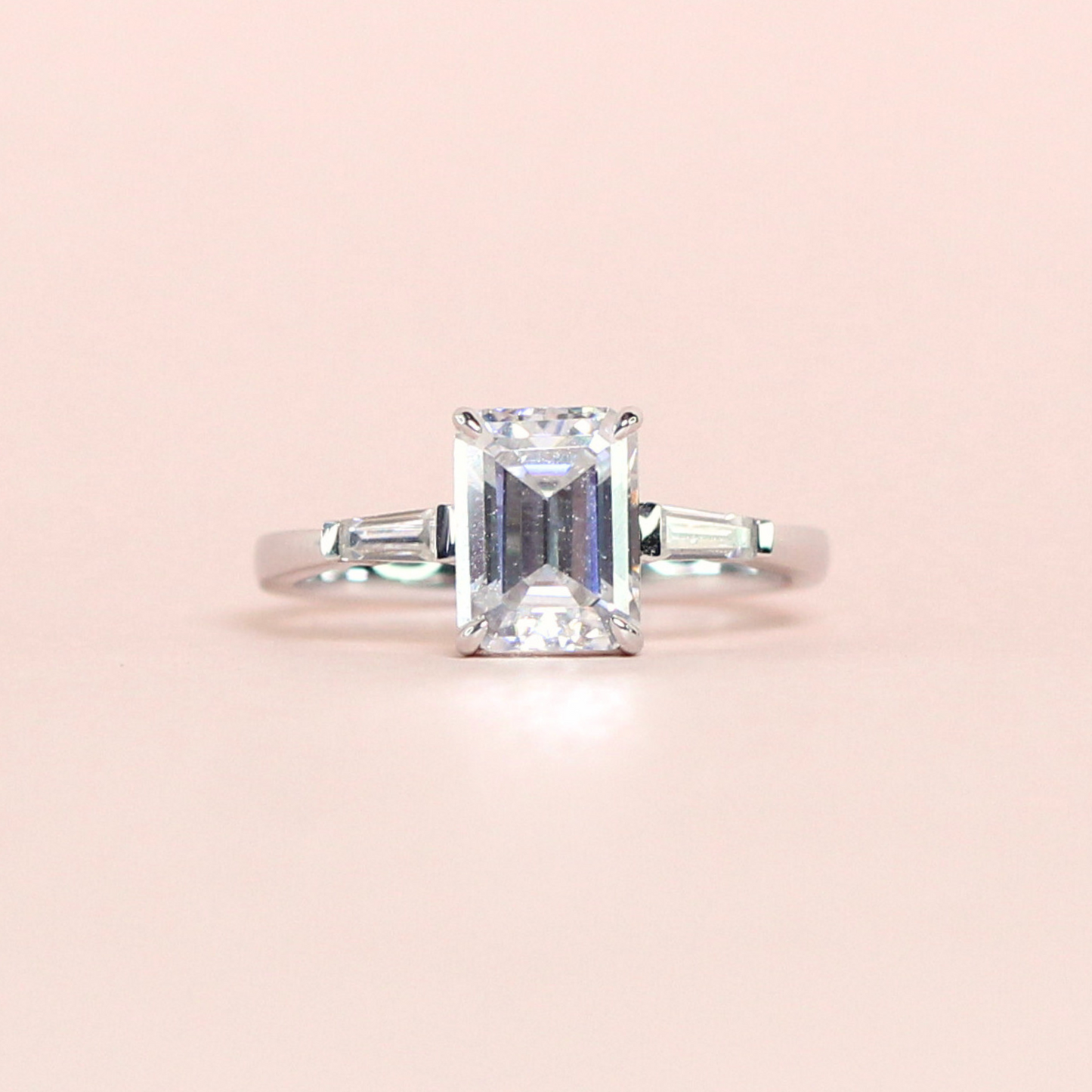2.15cts Emerald cut Trilogy Moissanite Ring