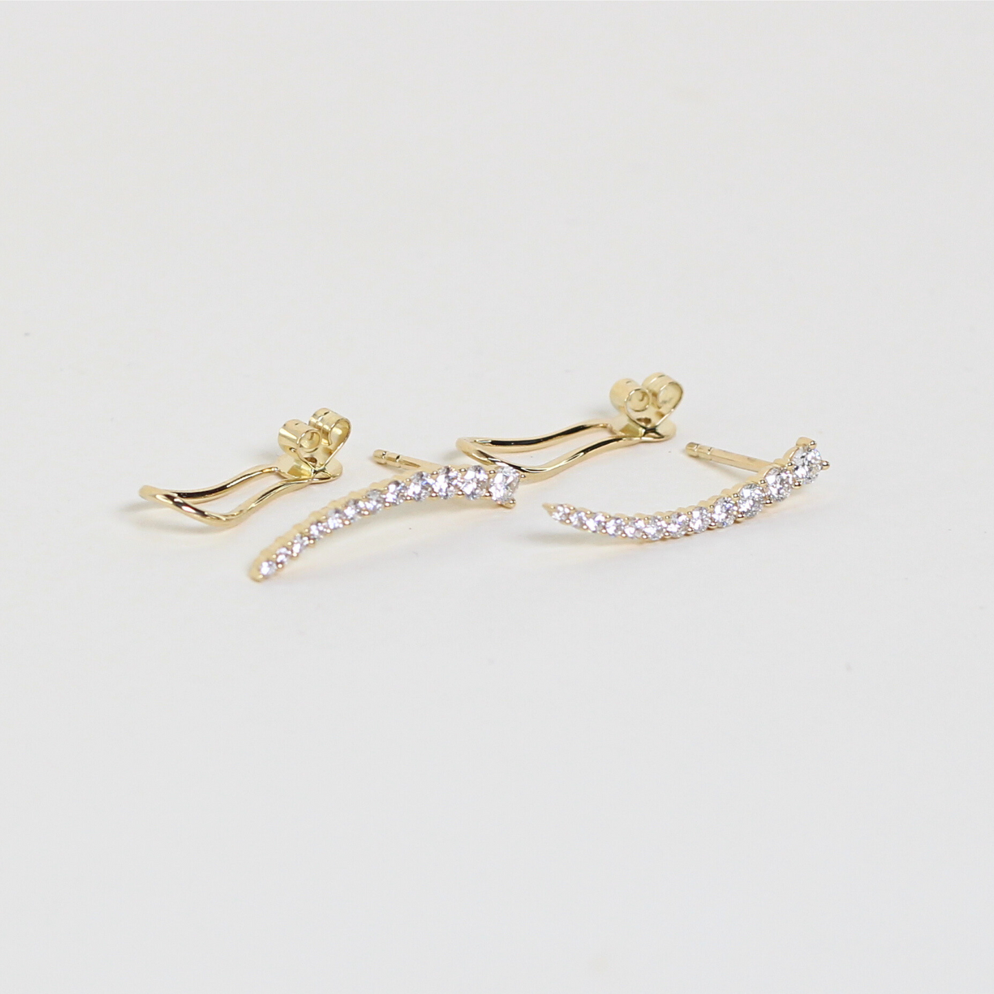 .94cts Graduating Crawler earrings