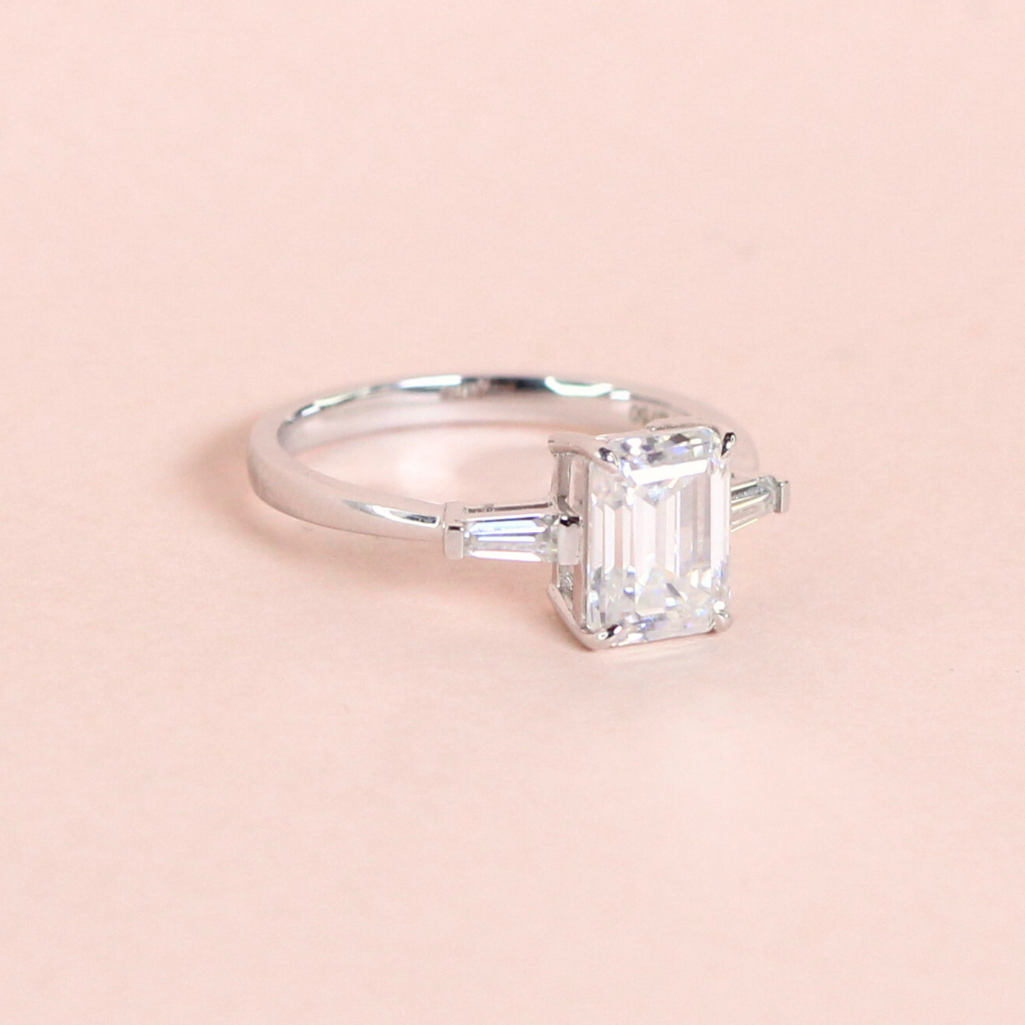 2.15cts Emerald cut Trilogy Moissanite Ring