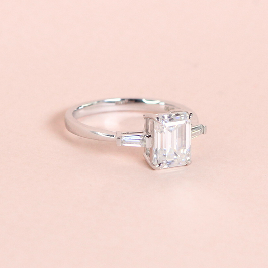 2.15cts Emerald cut Trilogy Moissanite Ring