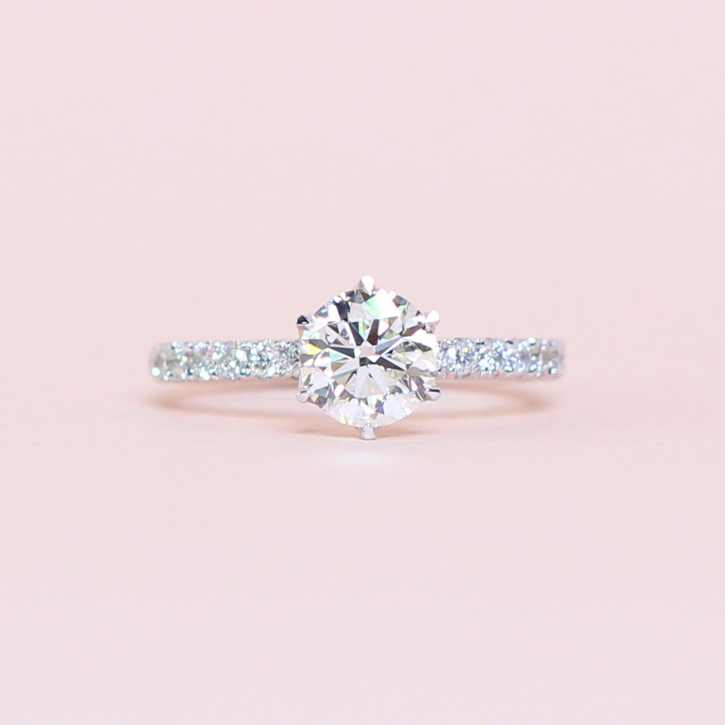 1ct Round Diamond ring in high petal prong pave setting