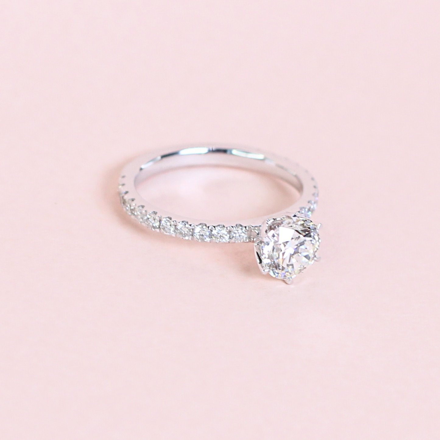 1ct Round Diamond ring in high petal prong pave setting
