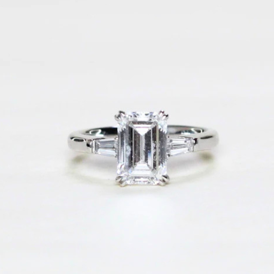 2.21cts Emerald cut Lab-grown trilogy ring