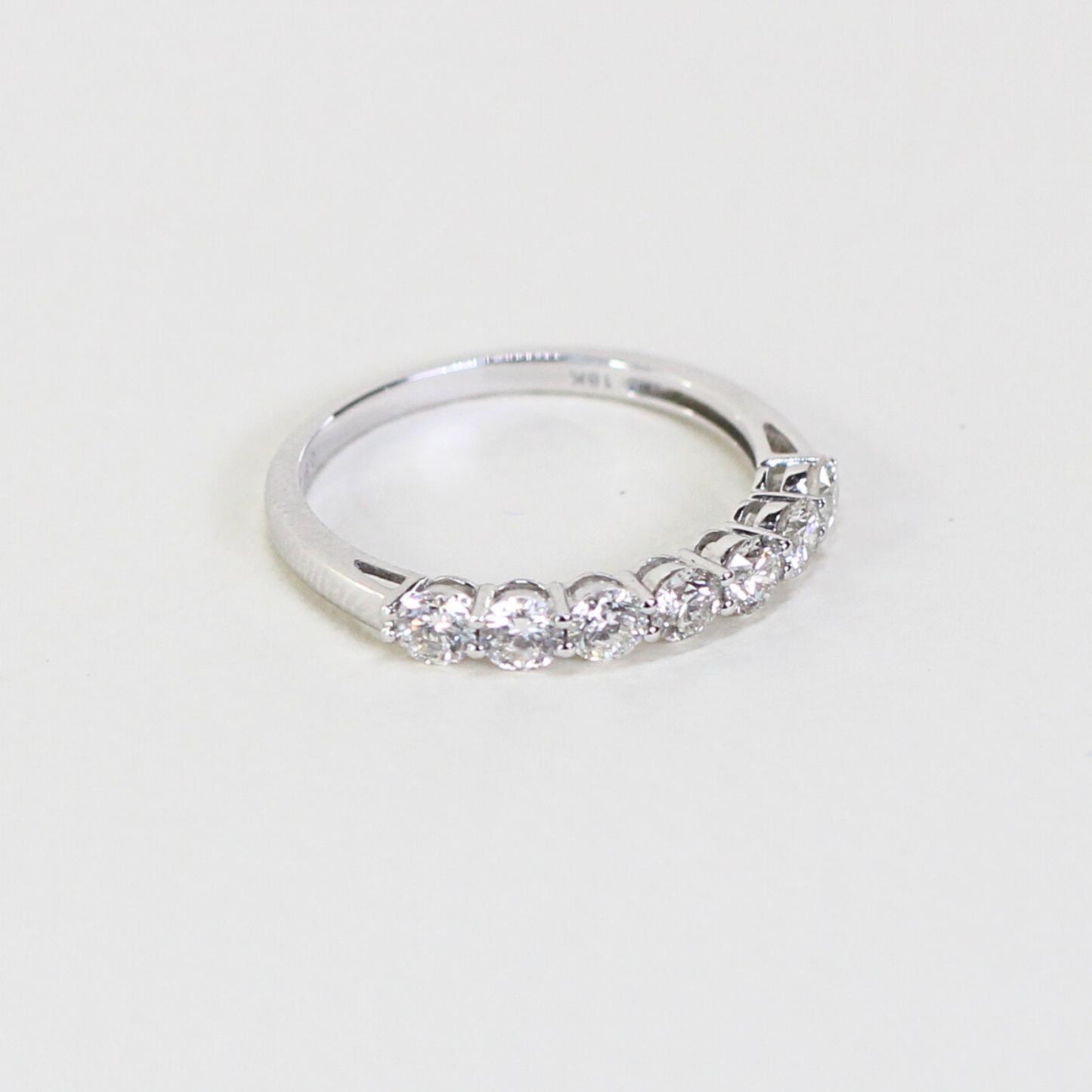 .84cts 7-stone Round cut ring