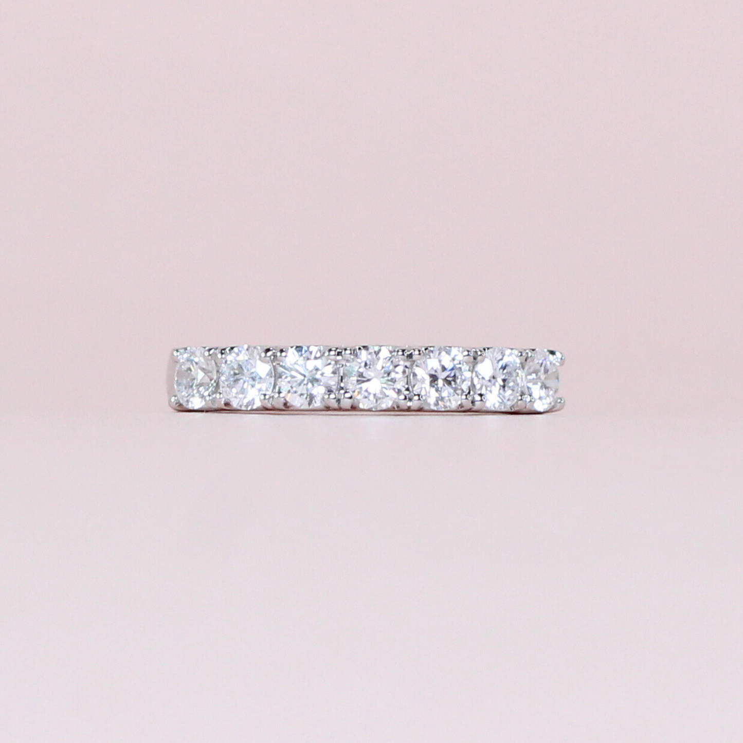 .77cts 7-stone Round cut ring