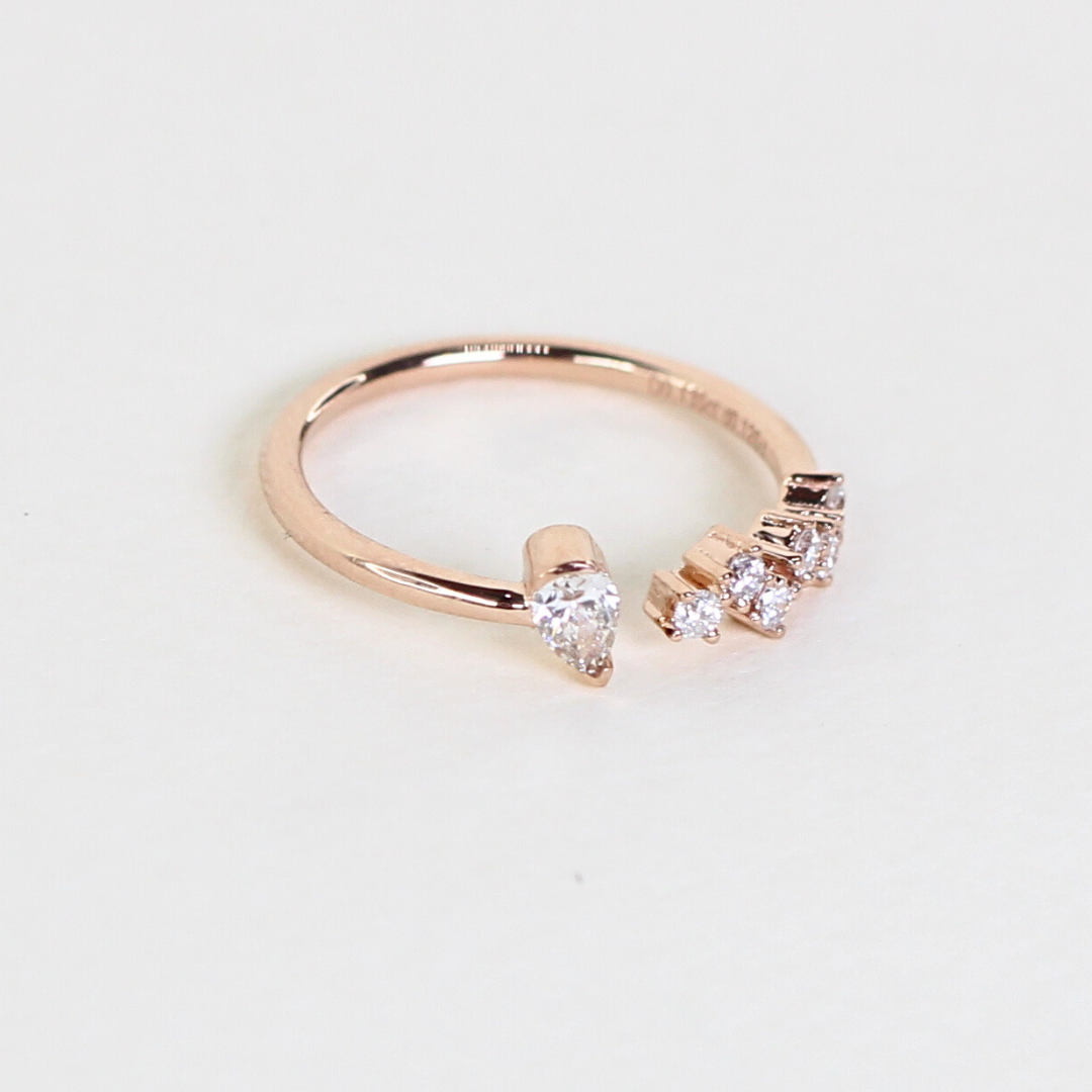 .26cts Pear and Round cut Open ring