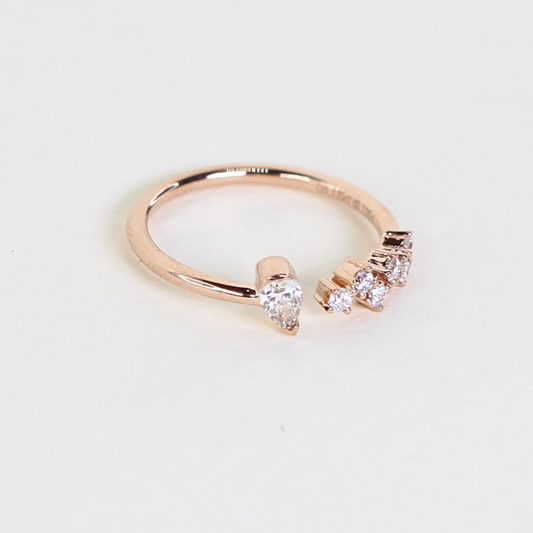 .26cts Pear and Round cut Open ring