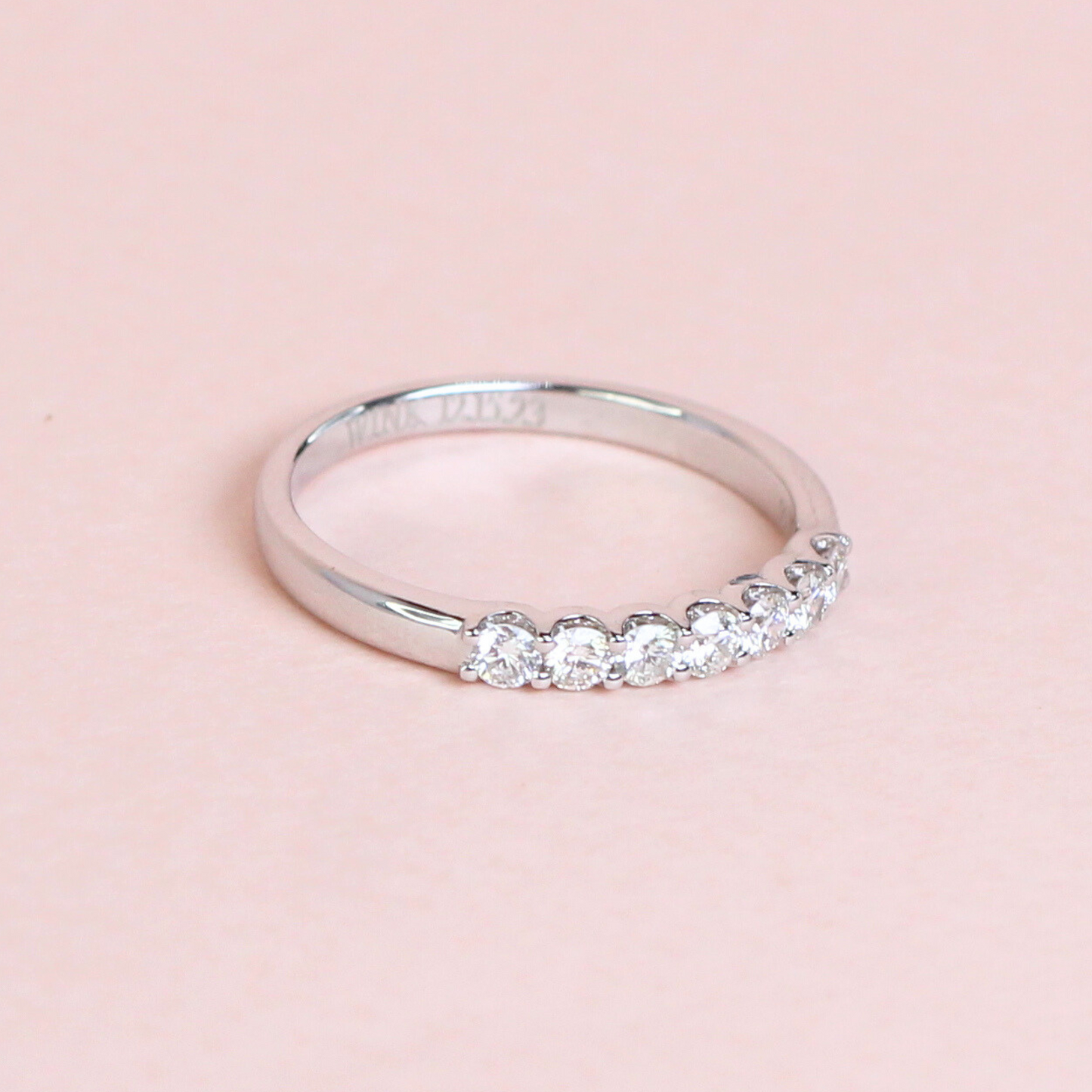 .35cts 7-stone Round cut ring