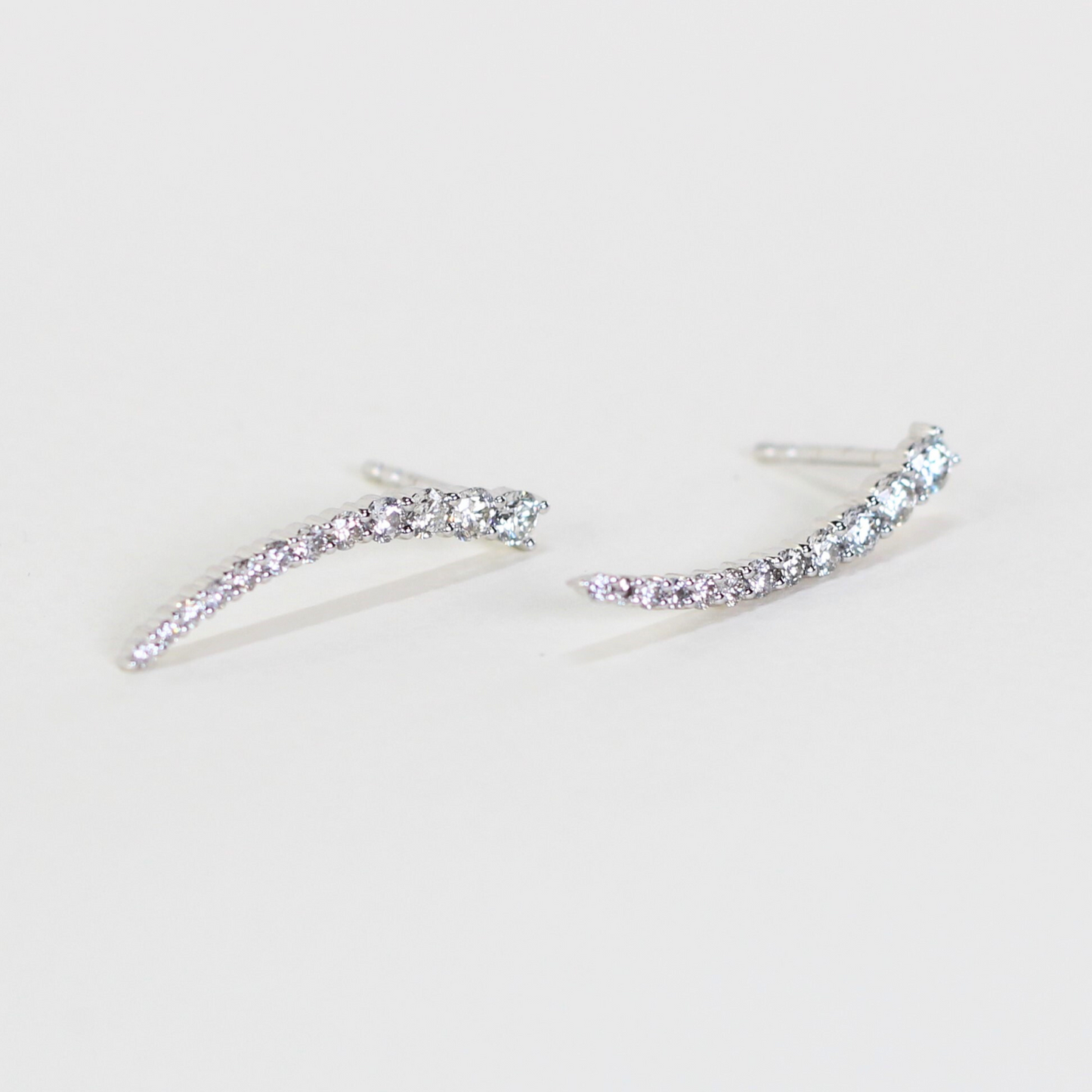 .94cts Graduating Crawler earrings