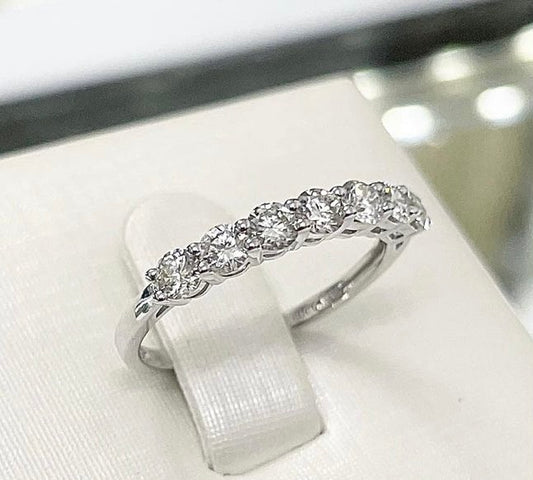 .56cts 7-stone Round cut ring