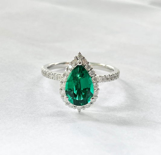 1.80cts Pear cut Emerald Pavé ring with Halo