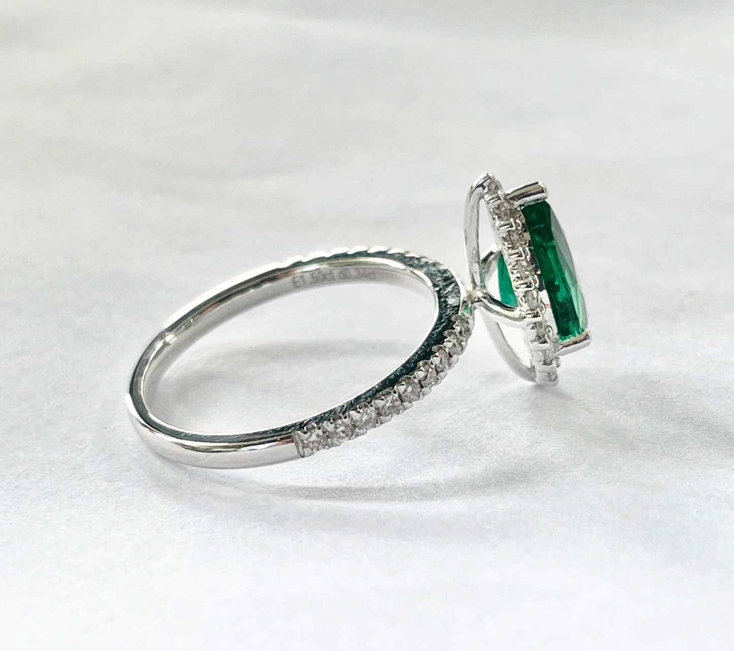 1.80cts Pear cut Emerald Pavé ring with Halo