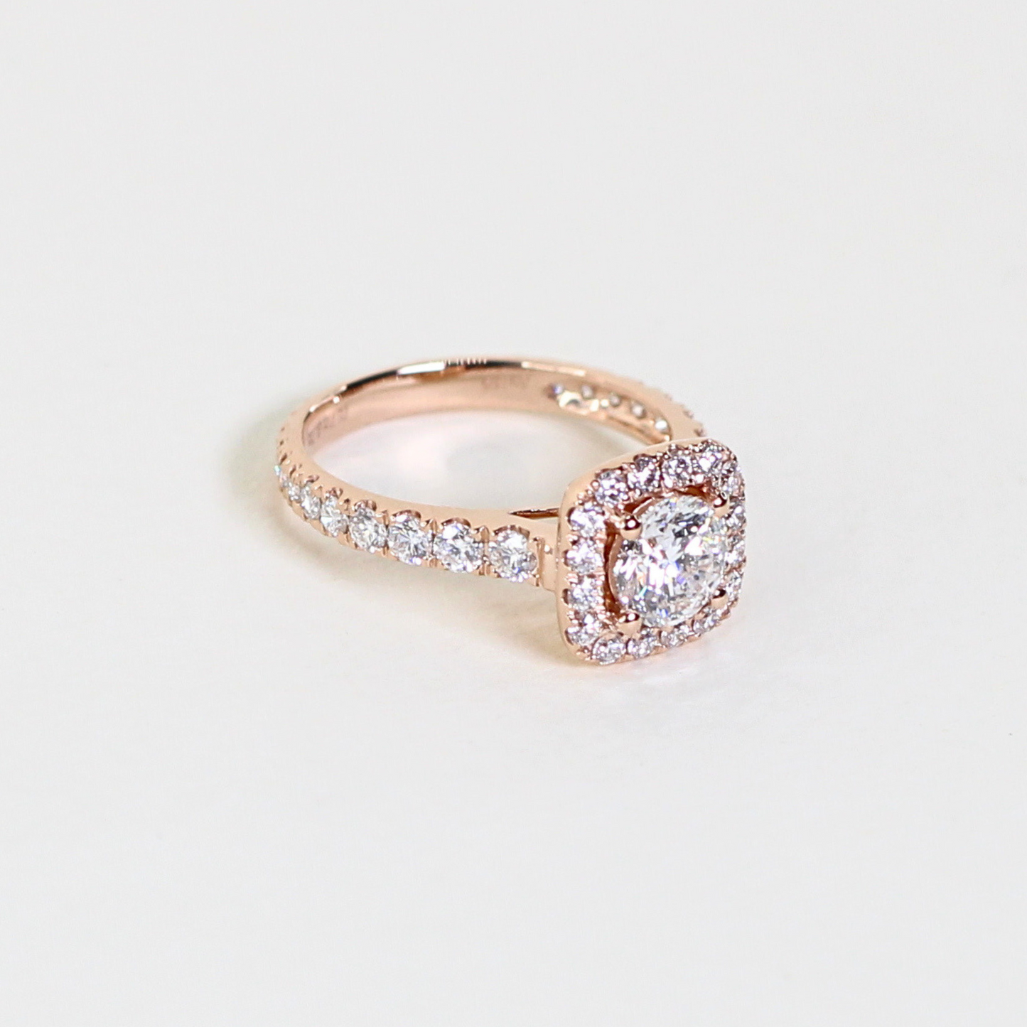 1.43cts Round cut Pavé ring with Halo