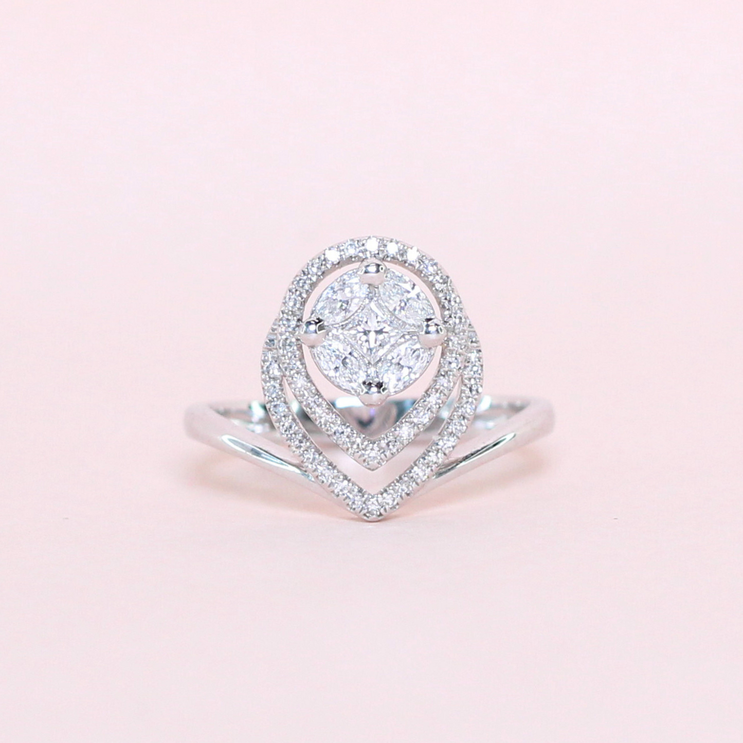 1cts Round Illusion ring with pear-shaped halo