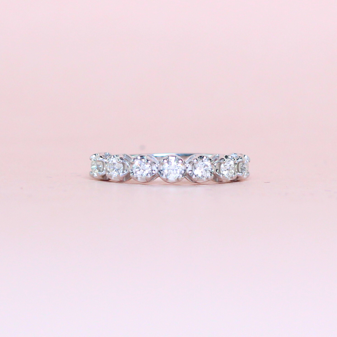 .46cts 7-stone Round cut ring