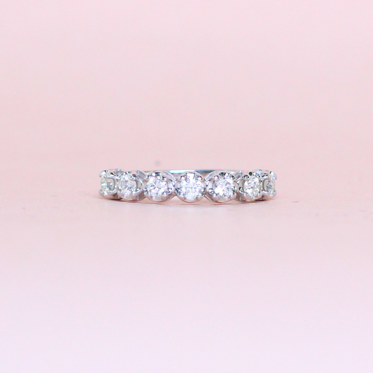 .46cts 7-stone Round cut ring