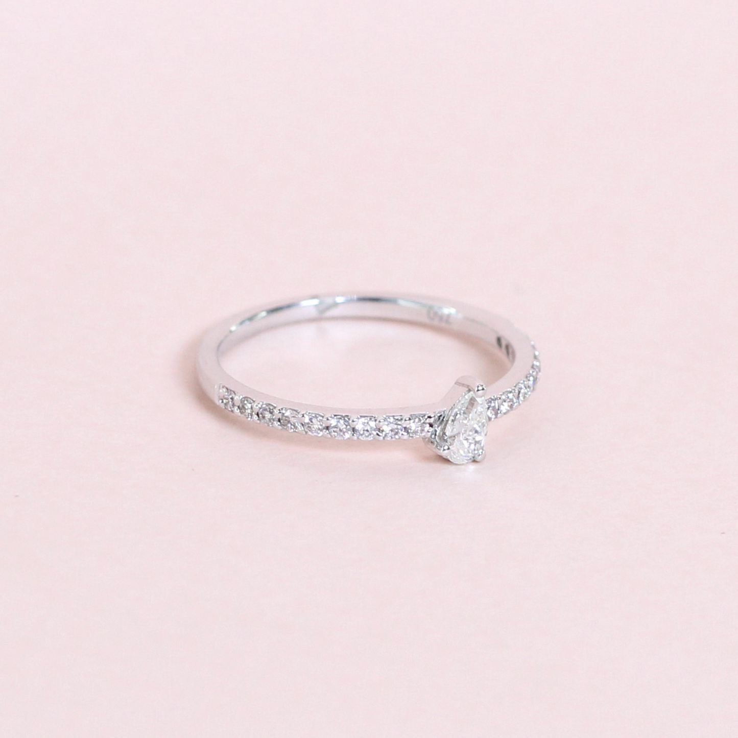 .37cts dainty pear half eternity ring