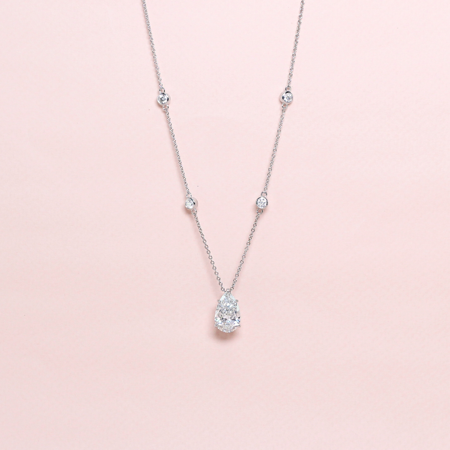 4.5ct Pear Brilliant Lab-grown diamond necklace with bezeled accent stones