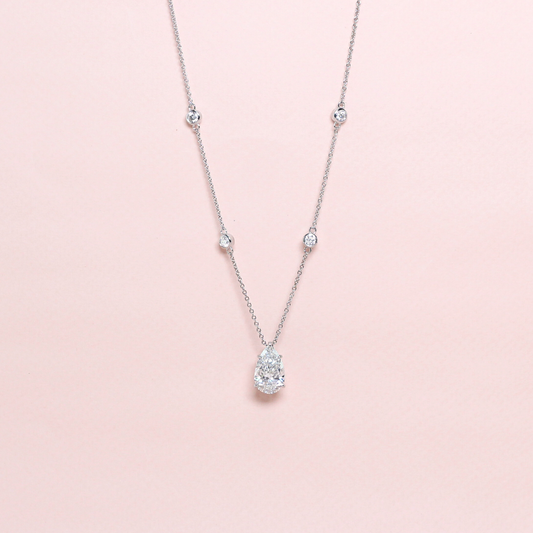4.5ct Pear Brilliant Lab-grown diamond necklace with bezeled accent stones