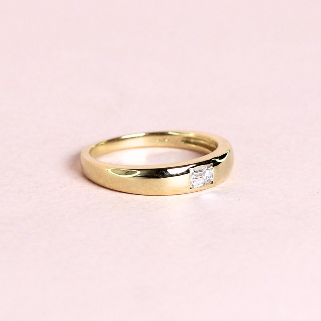 .20ct Emerald cut east-west Solo stone ring