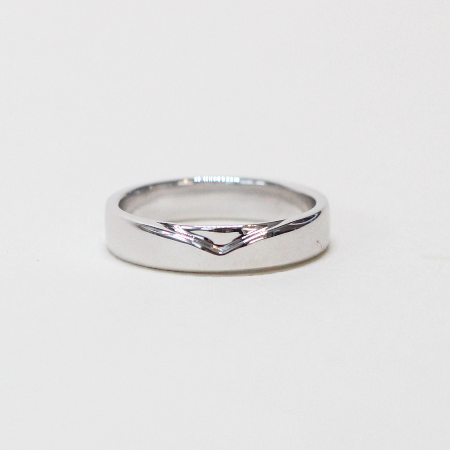 Plain Male wedding band with V-shaped accent