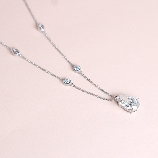 4.5ct Pear Brilliant Lab-grown diamond necklace with bezeled accent stones