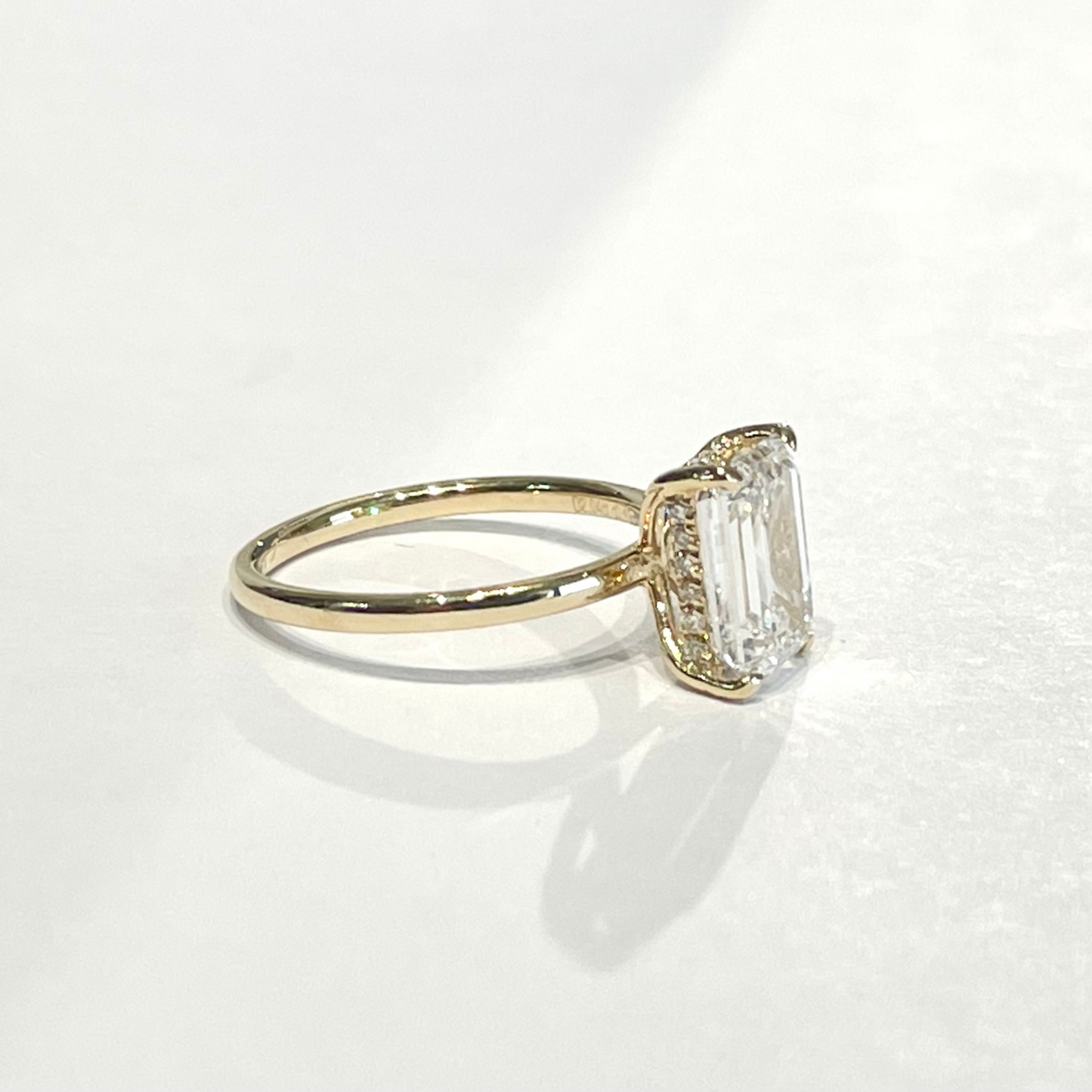 Emerald Diamond Ring with Hidden Halo
