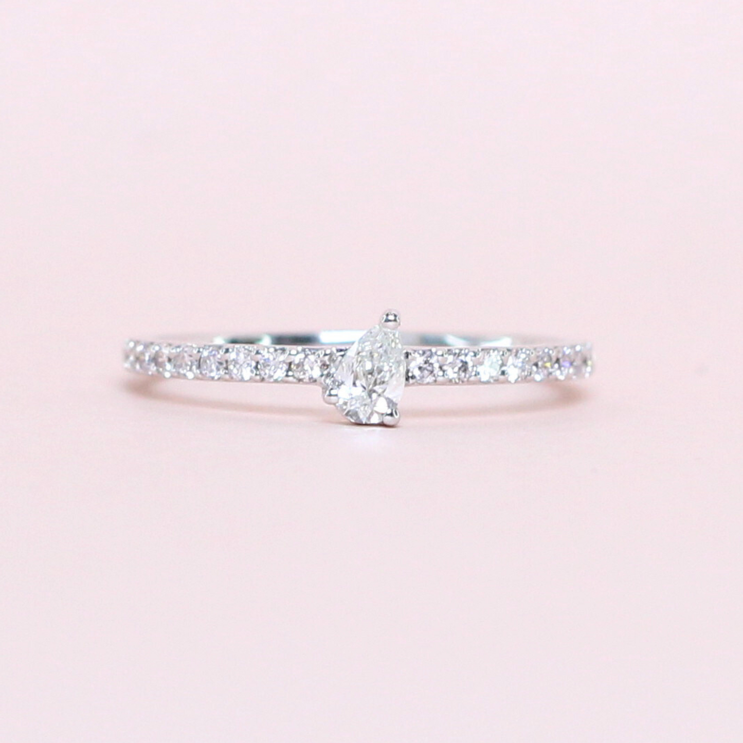 .37cts dainty pear half eternity ring